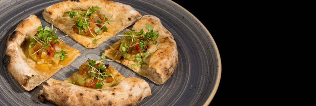 Sempre più erbe in pizzeria. Dove finisce la moda ed inizia il gusto.